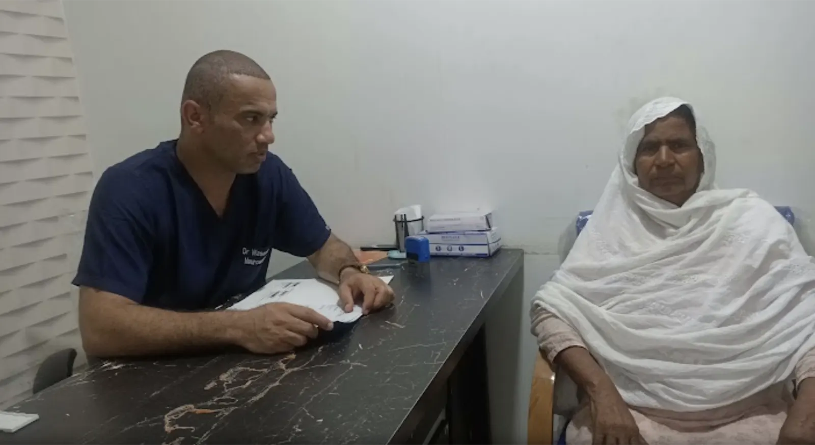 Dr. Waseem, in clinic